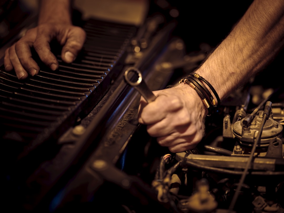 Mechanic working on a car for WillPlay auto repair demo